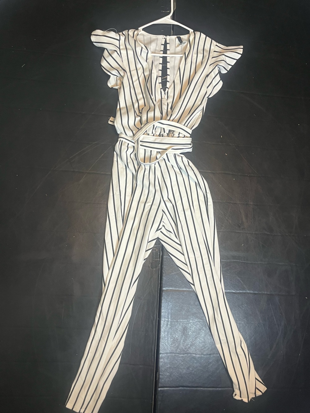 white/black striped jumpsuit with tie waist, size S
